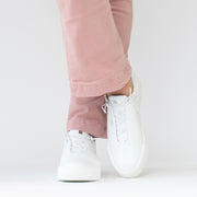 Hogl Bayly White Sneakers side. Size 10 womens shoes. On model front view